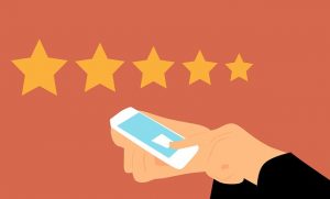A customer giving a 5 stars rating, signifying how important it is to use your website to build customer loyalty.