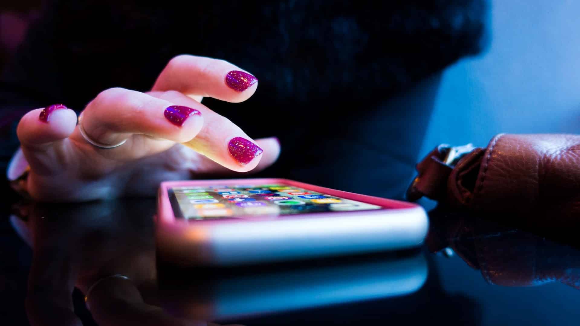 A woman using her phone.