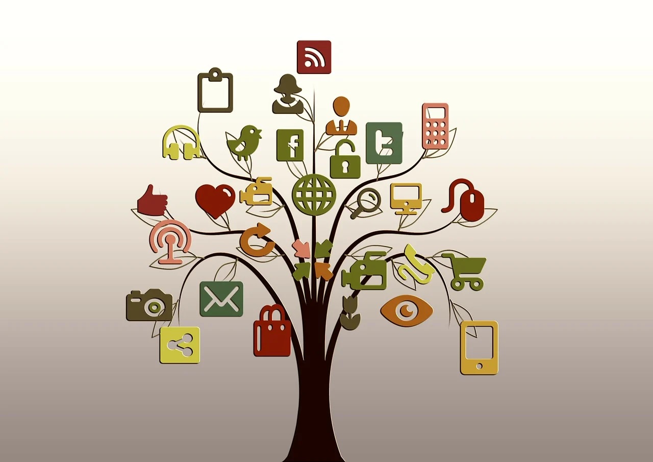 An illustration of a tree with social media and other icons on its branches.