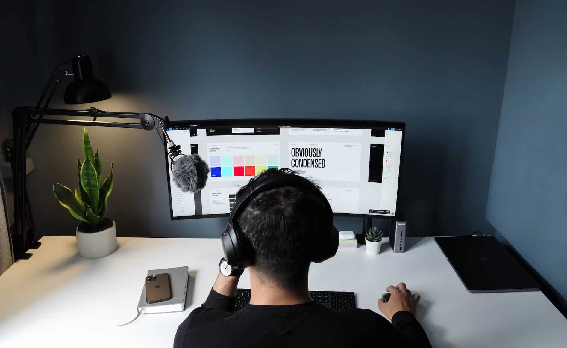  A person working on web design on a computer.