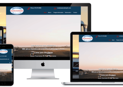 A trucking academy website displayed responsively on a desktop, laptop, tablet, and smartphone screen, showing the homepage with a logo, menu, and welcome message over a background of a truck yard at sunset.