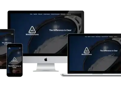 A responsive website for MotoSolutions is displayed on a smartphone, tablet, iMac, and laptop, each showing the homepage with the text “The Difference Is Clear” and a helmet with a clear visor as the background image.