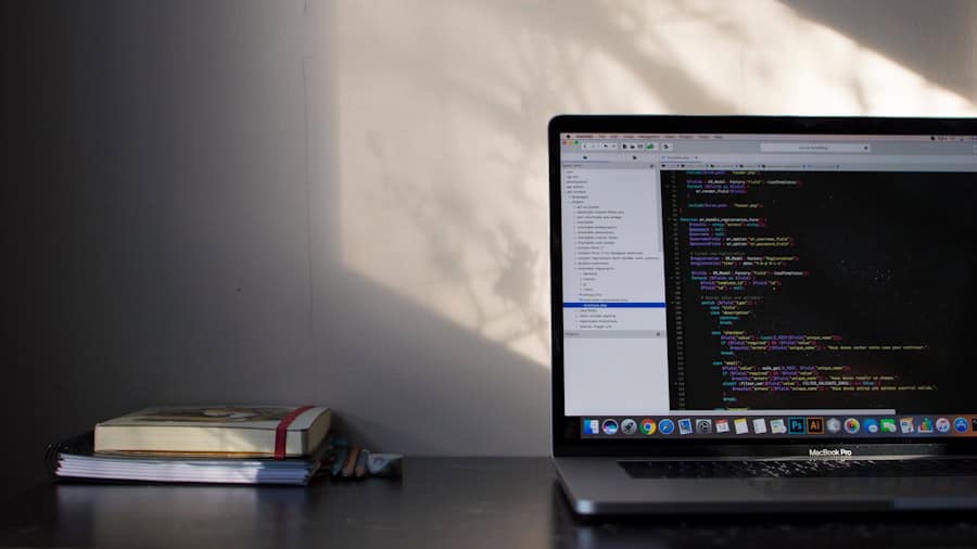 Laptop displaying code on a desk, representing website content and SEO optimization work